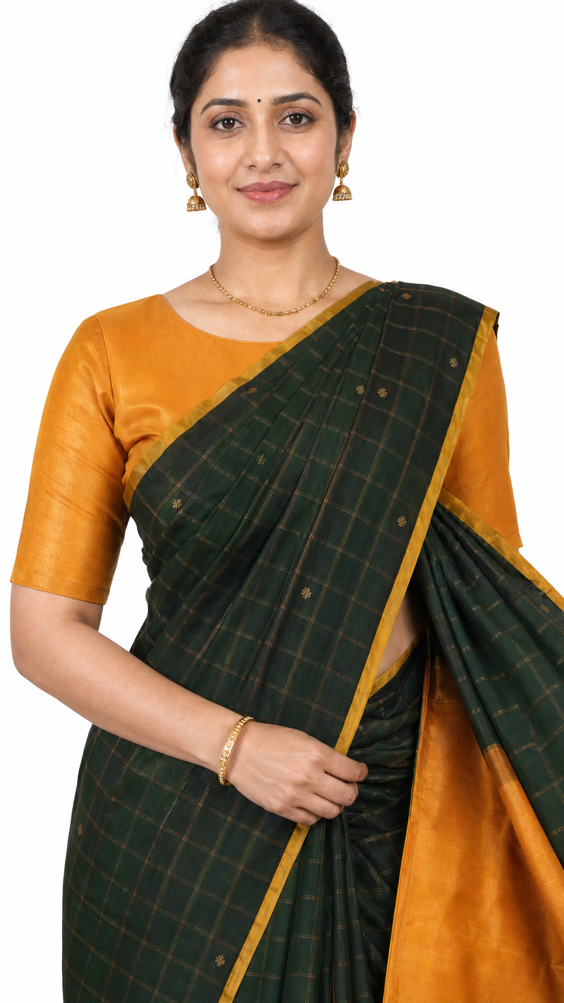 green check silk saree with orange blouse and gold border, pallu over shoulder