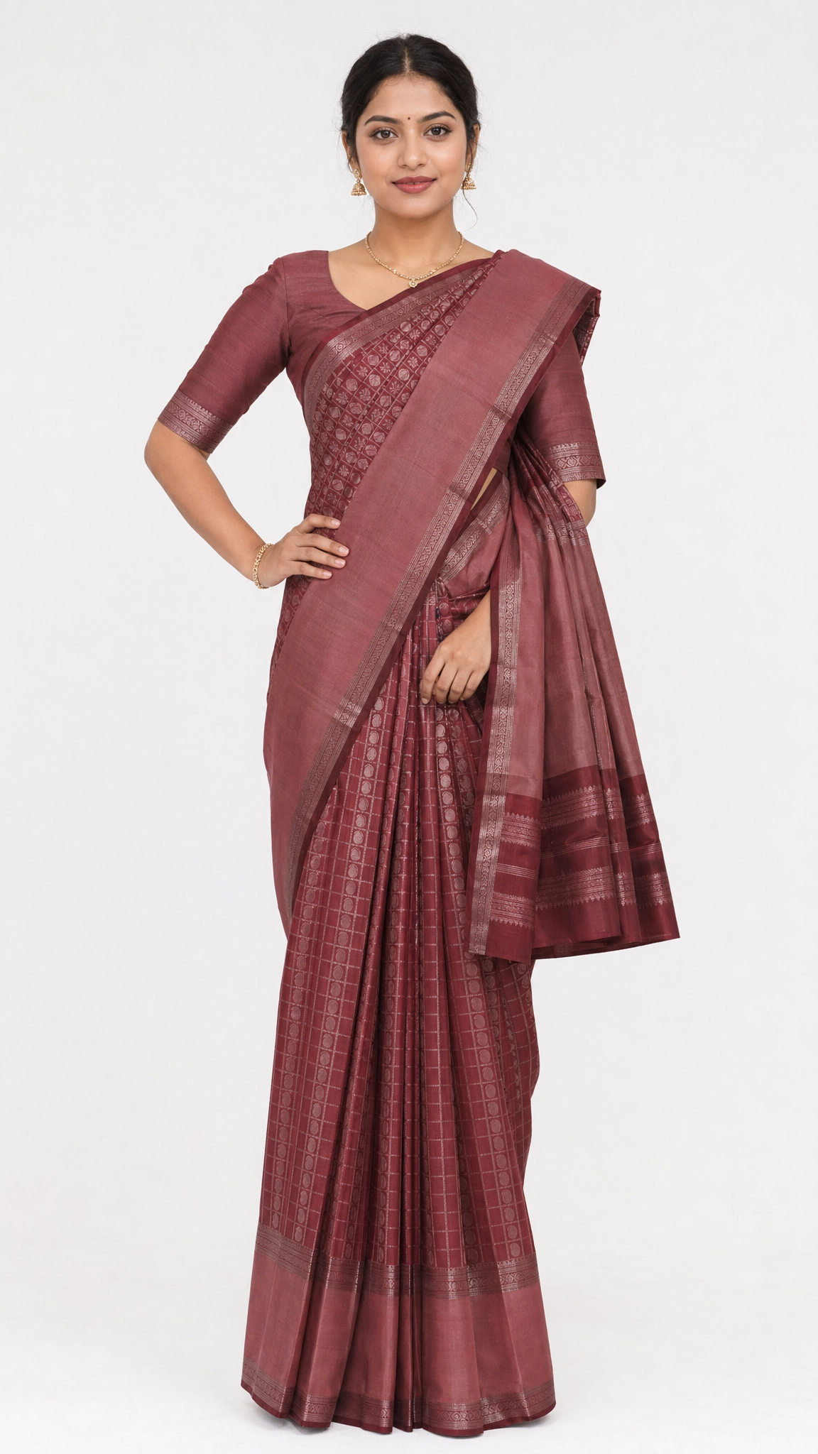 maroon kanjeevaram silk saree with temple border and woven pallu