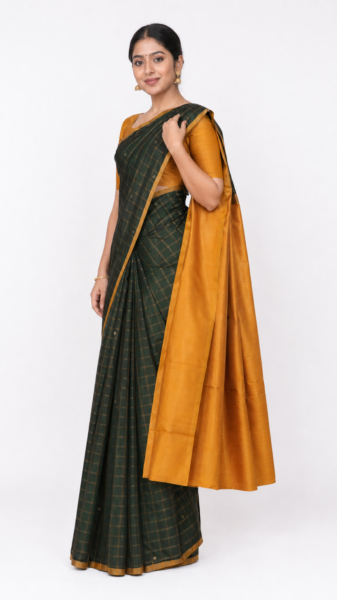 Kanjeevaram silk saree draped with dark green checked pattern and mustard pallu