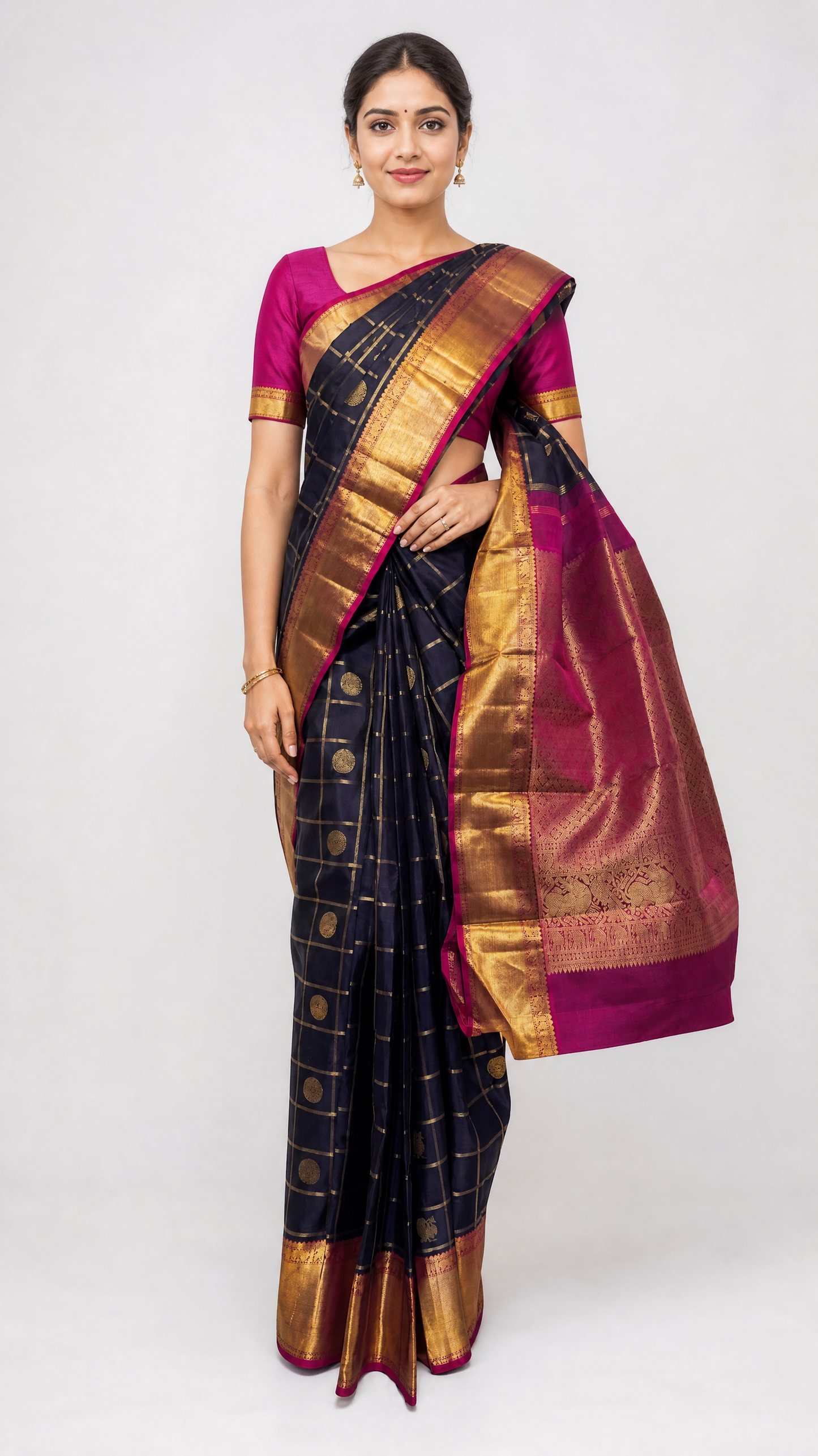 model wearing pure navy blue kanjivaram saree with kattam and butta pattern and magenta zari border blouse