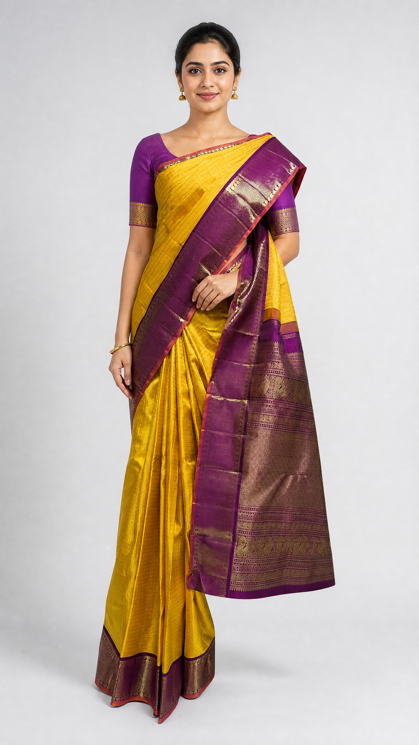 woman wearing pure kanjivaram silk saree with yellow checks and purple border